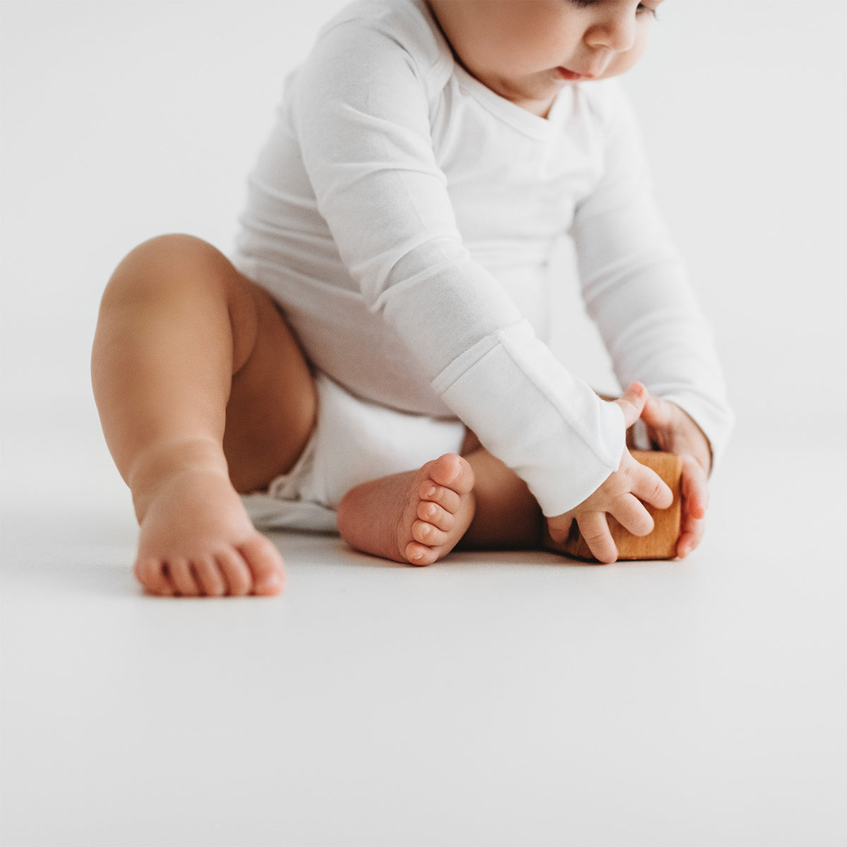 HappySkin® Baby Bodysuit with foldaway mittens